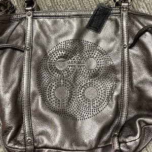 Metallic gray coach bag. Top handle or crossbody